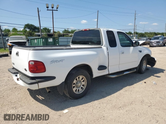 2002 Ford F-150 XL with VIN 1FTRX07W52KB08618, listed as a Copart auction lot 57941974 with 172,843 mi miles and Salvage title. Bid and sale history available at DreamBid. Image 3.