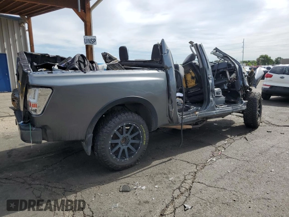 2015 Nissan Titan SL с VIN 1N6AA0EC7FN504896, выставлен на аукционе Copart как лот 59032405 с пробегом Не указан миль и На запчасти • Non repairable. История ставок и продаж доступна на DreamBid. Изображение 3.