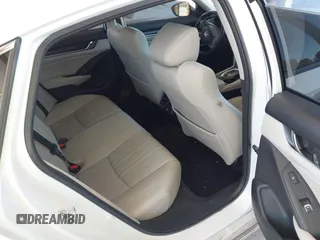 2022 Honda Accord Touring with VIN 1HGCV3F90NA011671, listed as a IAAI auction lot 42743890 with 76,728 mi miles and . Bid and sale history available at DreamBid. Image 8.
