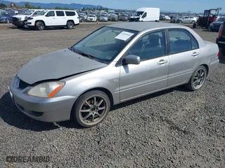 2005 Mitsubishi Lancer ES with VIN JA3AJ26E55U014748, listed as a IAAI auction lot 41935566 with 255,336 mi miles. Bid and sale history available at carsss.com. Image 2.