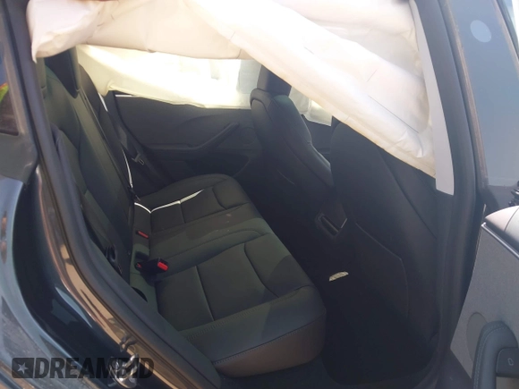 2024 Tesla Model 3 z VIN 5YJ3E1EA5RF843972, wystawiony jako IAAI lot #41873089 z przebiegiem 9 788 mil mil oraz . Historia ofert i sprzedaży dostępna na DreamBid. Obrazek 8.