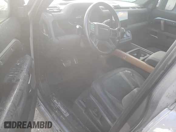 2023 Land Rover Defender X with VIN SALEXEEU6P2136280, listed as a Copart auction lot 77014604 with 27,736 mi miles and Salvage title. Bid and sale history available at DreamBid. Image 8.