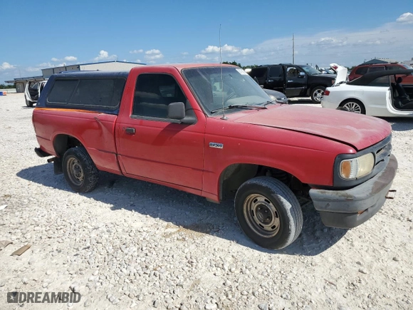 1994 Mazda B-Series 2WD Truck with VIN 4F4CR12AXRTN07635, listed as a Copart auction lot 66788284 with 255,020 mi miles and Salvage Title. Bid and sale history available at carsss.com. Image 4.