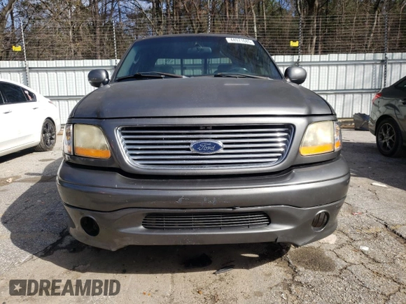 2002 Ford F-150 Harley Davidson with VIN 1FTRW07312KD72573, listed as a Copart auction lot 44971685 with 0 mi miles and Clean Title. Bid and sale history available at carsss.com. Image 5.