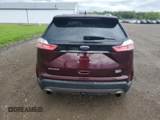 2020 Ford Edge SEL z VIN 2FMPK4J90LBA47802, wystawiony jako Copart lot #55102955 z przebiegiem 59 649 mil mil oraz Szkody całkowita. Historia ofert i sprzedaży dostępna na DreamBid. Obrazek 6.
