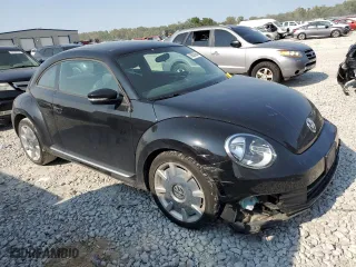 2012 Volkswagen Beetle 2.5L w/Sun PZEV with VIN 3VWJP7ATXCM611427, listed as a Copart auction lot 70628964 with 80,184 mi miles and Salvage Title. Bid and sale history available at carsss.com. Image 4.