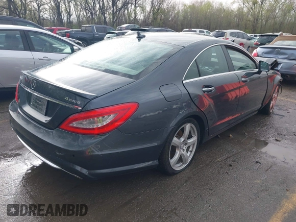 2014 Mercedes-Benz CLS 550 with VIN WDDLJ9BBXEA089595, listed as a IAAI auction lot 41892913 with 136,740 mi miles and . Bid and sale history available at DreamBid. Image 4.