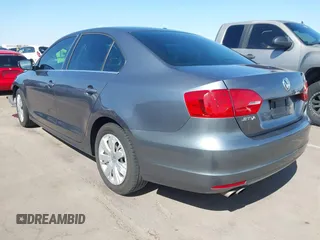 2013 Volkswagen Jetta Sedan SE with VIN 3VWDP7AJ8DM384221, listed as a IAAI auction lot 42023691 with 157,403 mi miles. Bid and sale history available at carsss.com. Image 3.