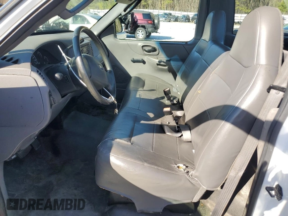 2003 Ford F-150 XL with VIN 2FTRF17WX3CB10461, listed as a Copart auction lot 48663195 with 94,954 mi miles and Salvage Title. Bid and sale history available at DreamBid. Image 7.