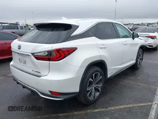 2020 Lexus RX with VIN 2T2HGMDA1LC052493, listed as a IAAI auction lot 41450535 with 63,547 mi miles. Bid and sale history available at carsss.com. Image 4.