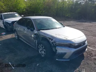 2022 Honda Civic Sport z VIN 2HGFE2F5XNH539174, wystawiony jako IAAI lot #41882680 z przebiegiem 15 664 mil mil oraz . Historia ofert i sprzedaży dostępna na DreamBid. Obrazek 6.