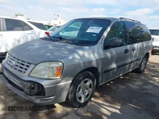 2005 Ford Freestar SE z VIN 2FMZA51685BA03136, wystawiony jako IAAI lot #41677029 z przebiegiem 220 511 mil mil oraz . Historia ofert i sprzedaży dostępna na DreamBid. Obrazek 2.