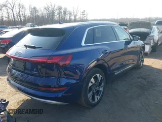 2021 Audi e-tron Premium Plus with VIN WA1LAAGE3MB028896, listed as a IAAI auction lot 41415811 with 39,770 mi miles and . Bid and sale history available at DreamBid. Image 4.