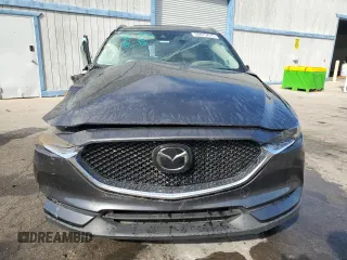 2018 Mazda CX-5 Grand Touring with VIN JM3KFADM1J1426938, listed as a Copart auction lot 50873615 with 83,436 mi miles and Clean Title. Bid and sale history available at carsss.com. Image 5.