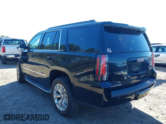 2015 GMC Yukon SLE with VIN 1GKS2AKC4FR720667, listed as a IAAI auction lot 41822277 with 134,984 mi miles and . Bid and sale history available at DreamBid. Image 3.
