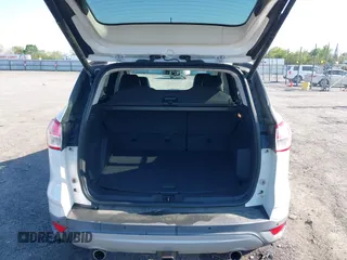 2013 Ford Escape Titanium with VIN 1FMCU0J97DUA70393, listed as a IAAI auction lot 41974106 with 73,548 mi miles and . Bid and sale history available at carsss.com. Image 17.