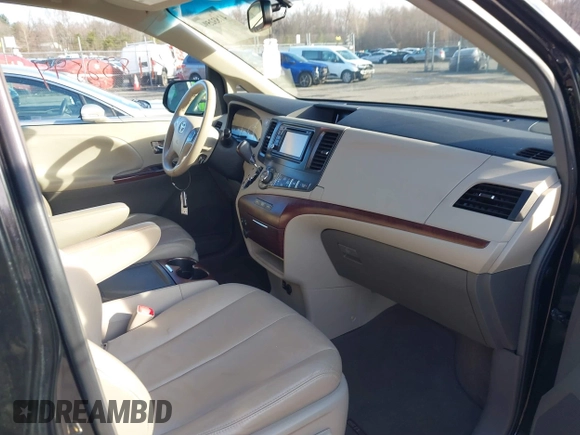 2013 Toyota Sienna XLE with VIN 5TDDK3DC0DS067993, listed as a IAAI auction lot 41832594 with 159,364 mi miles and . Bid and sale history available at DreamBid. Image 5.