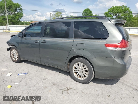 2014 Toyota Sienna XLE with VIN 5TDYK3DC2ES439353, listed as a Copart auction lot 54332275 with 130,312 mi miles and Salvage Title. Bid and sale history available at DreamBid. Image 2.