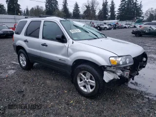 2006 Ford Escape Hybrid with VIN 1FMCU95H36KC95950, listed as a Copart auction lot 83957834 with 139,141 mi miles and Salvage title. Bid and sale history available at DreamBid. Image 4.
