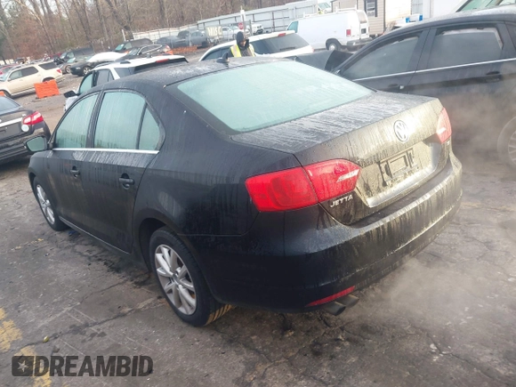 2014 Volkswagen Jetta Sedan SE with VIN 3VWD17AJ1EM322226, listed as a IAAI auction lot 41211984 with 217,084 mi miles. Bid and sale history available at carsss.com. Image 3.