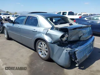 2006 Chrysler 300 C with VIN 2C3KA63H56H313967, listed as a IAAI auction lot 42056998 with 143,592 mi miles and . Bid and sale history available at carsss.com. Image 3.
