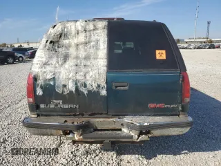 1997 GMC Suburban z VIN 3GKFK16R7VG514905, wystawiony jako Copart lot #77410934 z przebiegiem 193 116 mil mil oraz Szkoda całkowita • Salvage title. Historia ofert i sprzedaży dostępna na DreamBid. Obrazek 6.