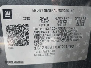 2018 Chevrolet Malibu LS with VIN 1G1ZB5STXJF211493, listed as a IAAI auction lot 42141666 with 126,529 mi miles and . Bid and sale history available at DreamBid. Image 9.