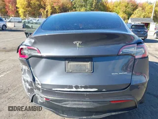2020 Tesla Model Y Long Range with VIN 5YJYGDEE0LF041762, listed as a IAAI auction lot 40556913 with Not Provided miles and . Bid and sale history available at DreamBid. Image 17.