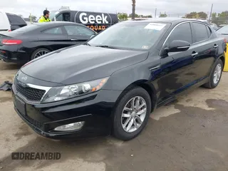2012 Kia Optima LX with VIN KNAGM4A72C5291451, listed as a IAAI auction lot 42068559 with 121,548 mi miles and . Bid and sale history available at carsss.com. Image 2.