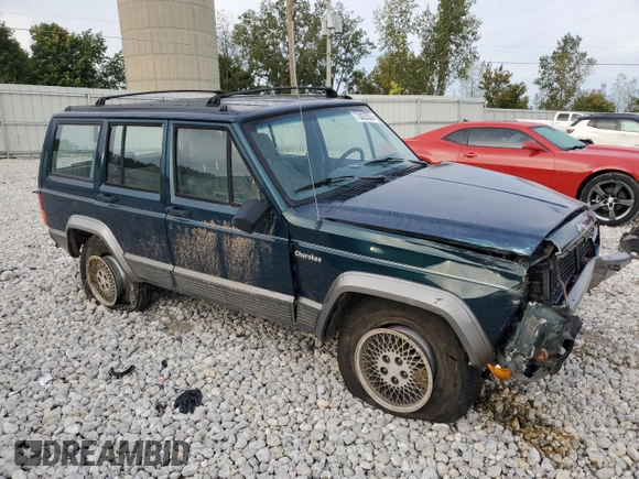 1996 Jeep Cherokee Country with VIN 1J4FJ78S7TL242853, listed as a Copart auction lot 73022554 with 84,868 mi miles and Salvage Title. Bid and sale history available at carsss.com. Image 4.