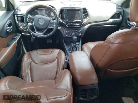 2019 Jeep Cherokee z VIN 1C4PJLJN0KD215834, wystawiony jako Copart lot #57652975 z przebiegiem 127 986 mil mil oraz Czysty tytuł • Clean title. Historia ofert i sprzedaży dostępna na DreamBid. Obrazek 8.