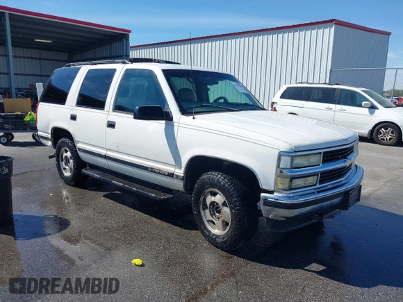 1999 Chevrolet Tahoe Z71 with VIN 1GNEK13R3XJ412067, listed as a IAAI auction lot 41789660 with 196,916 mi miles and . Bid and sale history available at DreamBid. Image 1.