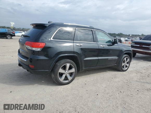 2015 Jeep Grand Cherokee Overland with VIN 1C4RJFCT6FC628729, listed as a Copart auction lot 44979155 with 105,959 mi miles and Salvage Title. Bid and sale history available at DreamBid. Image 3.
