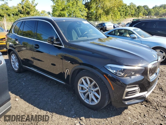 2022 BMW X5 xDrive45e with VIN 5UXTA6C01N9H53033, listed as a Copart auction lot 71154564 with 23,269 mi miles and Salvage Title. Bid and sale history available at carsss.com. Image 4.