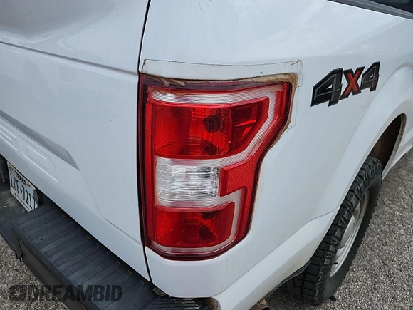 2018 Ford F-150 XL with VIN 1FTMF1EB8JKF43215, listed as a IAAI auction lot 42835300 with 126,575 mi miles and . Bid and sale history available at DreamBid. Image 12.