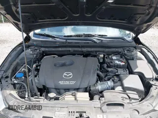 2016 Mazda 3 i Touring with VIN 3MZBM1V71GM298748, listed as a IAAI auction lot 42389384 with 65,564 mi miles and . Bid and sale history available at DreamBid. Image 10.