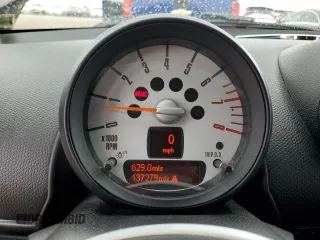 2013 MINI Countryman z VIN WMWZB3C53DWM31457, wystawiony jako Copart lot #55528885 z przebiegiem 137 279 mil mil oraz Szkoda całkowita • Salvage title. Historia ofert i sprzedaży dostępna na DreamBid. Obrazek 9.