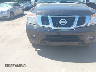 2014 Nissan Armada Platinum z VIN 5N1BA0NE9EN611807, wystawiony jako IAAI lot #42297717 z przebiegiem 199 541 mil mil oraz . Historia ofert i sprzedaży dostępna na DreamBid. Obrazek 6.