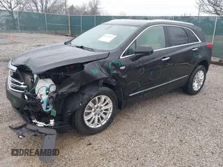 2018 Cadillac XT5 FWD with VIN 1GYKNARS6JZ160993, listed as a IAAI auction lot 41472847 with 113,415 mi miles. Bid and sale history available at carsss.com. Image 17.