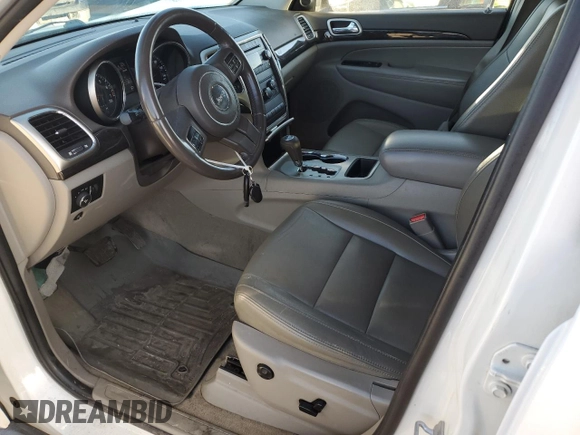 2011 Jeep Grand Cherokee Laredo with VIN 1J4RR4GG4BC640277, listed as a Copart auction lot 52166205 with 195,877 mi miles and Salvage Title. Bid and sale history available at DreamBid. Image 7.