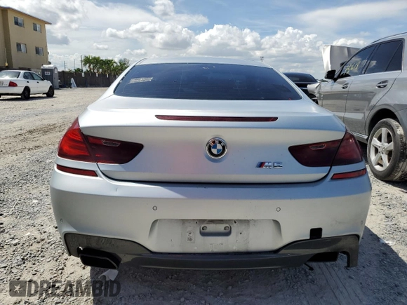2013 BMW 6 Series 650i with VIN WBAYM9C59DDW20408, listed as a Copart auction lot 73585214 with 143,605 mi miles and Clean Title. Bid and sale history available at carsss.com. Image 6.