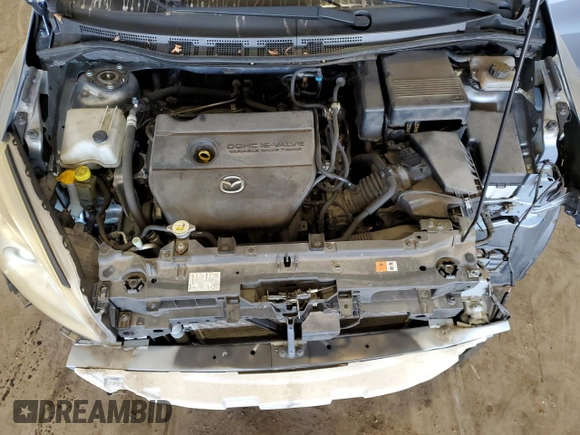 2012 Mazda 5 Touring with VIN JM1CW2CL0C0105090, listed as a Copart auction lot 74963864 with 88,759 mi miles and Salvage Title. Bid and sale history available at DreamBid. Image 12.