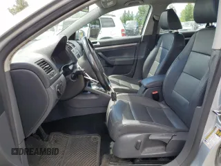 2009 Volkswagen Jetta SE with VIN 3VWRM71K99M156016, listed as a Copart auction lot 57711095 with 206,869 mi miles and Clean title. Bid and sale history available at DreamBid. Image 7.