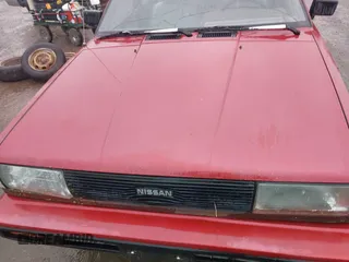 1990 Nissan Sentra z VIN JN1GB21B5LU503902, wystawiony jako IAAI lot #42358723 z przebiegiem 172 484 mil mil oraz . Historia ofert i sprzedaży dostępna na DreamBid. Obrazek 10.