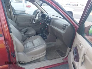 2001 Isuzu Rodeo S z VIN 4S2CK58W414308980, wystawiony jako IAAI lot #42496432 z przebiegiem 166 360 mil mil oraz . Historia ofert i sprzedaży dostępna na DreamBid. Obrazek 5.