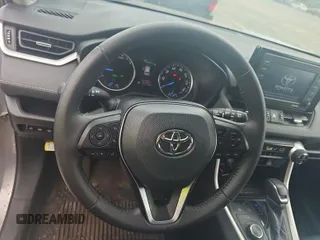 2022 Toyota RAV4 Hybrid XLE Premium with VIN 4T3B6RFV2NU084419, listed as a IAAI auction lot 42729518 with 76,607 mi miles and . Bid and sale history available at DreamBid. Image 14.