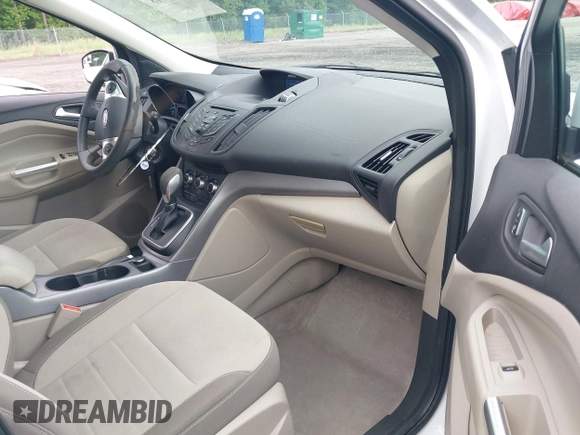 2014 Ford Escape SE with VIN 1FMCU9G90EUB76911, listed as a IAAI auction lot 42143518 with 123,466 mi miles and . Bid and sale history available at DreamBid. Image 5.