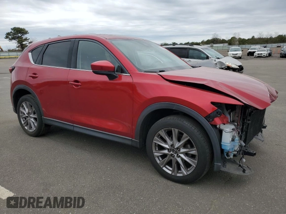 2019 Mazda CX-5 Grand Touring with VIN JM3KFBDM3K1511559, listed as a Copart auction lot 53542515 with 71,786 mi miles and Salvage Title. Bid and sale history available at carsss.com. Image 4.