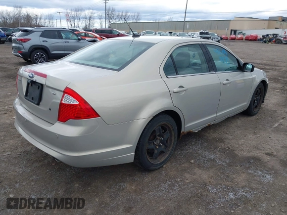 2010 Ford Fusion SE with VIN 3FAHP0HA6AR409302, listed as a IAAI auction lot 42040173 with 167,088 mi miles. Bid and sale history available at carsss.com. Image 4.