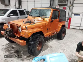 1998 Jeep Wrangler Sahara z VIN 1J4FY49S1WP802940, wystawiony jako IAAI lot #41433820 z przebiegiem 122 180 mil mil oraz . Historia ofert i sprzedaży dostępna na DreamBid. Obrazek 2.